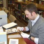 Matthew Saunders exploring the Ramsey Family Papers at the Cleveland Bradley County Library History Branch.